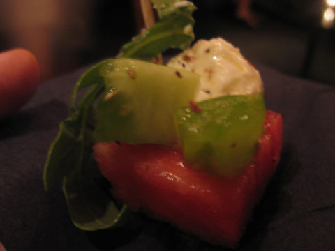 tomato watermelon salad with goat cheese,  arugala, and juniper