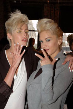 Gwen Stefani and a L.A.M.B. model show off their white polish