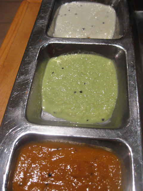 coconut, cilantro, and another spicy chutney that came out with our dosas